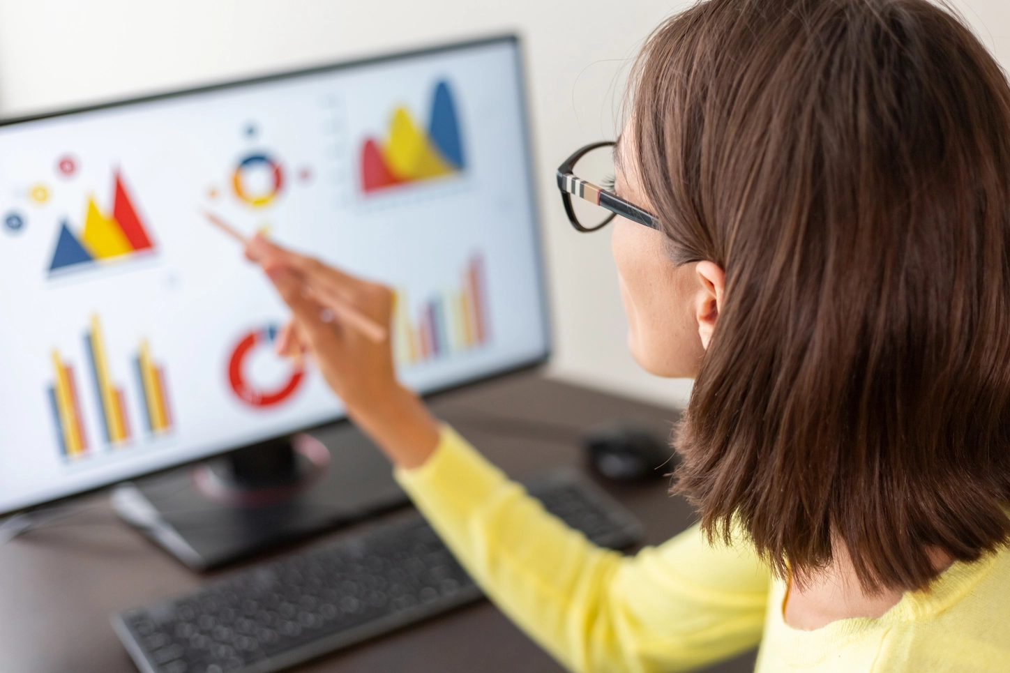 Woman working with dashboards in a computer
